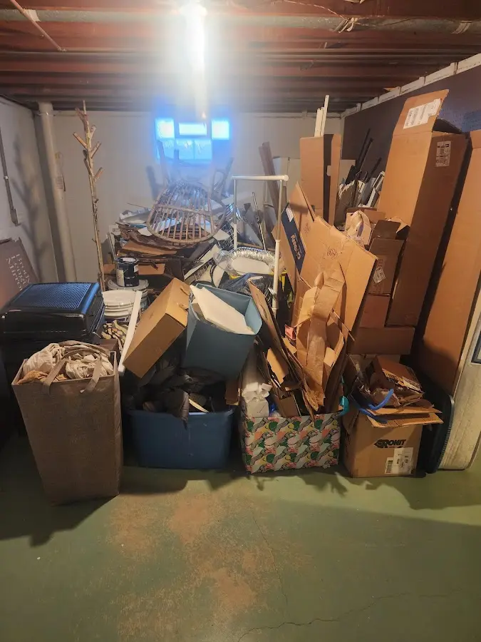 Roll-off dumpster container at job site for 2 Yard Dumpster Rental in Sumner